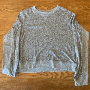 Out from under sweater